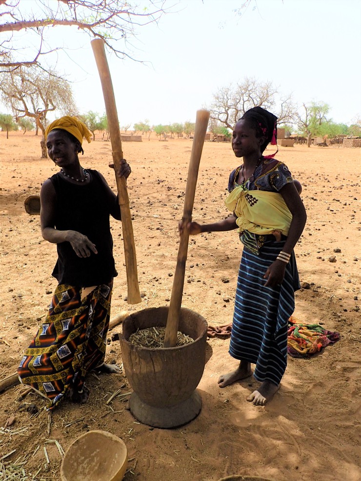 Pounding millet in Dogon Country, Mali